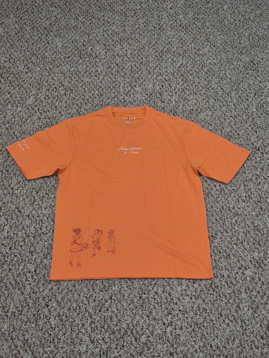 Bright orange Jordan Women's Paris Collective x Cheetah T-Shirt featuring small